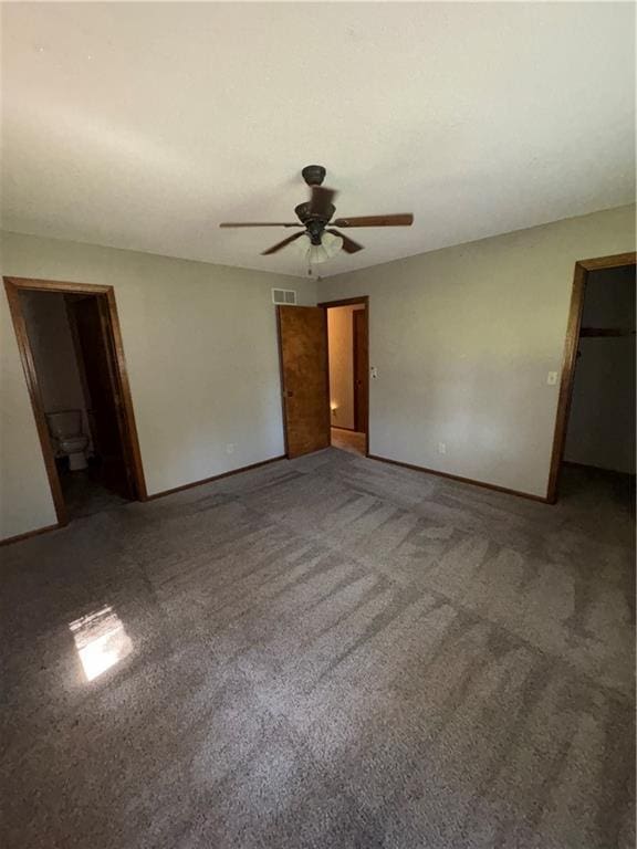 105 N Hayes St, Garnett, KS 66032 - unfurnished bedroom with carpet and a ceiling fan