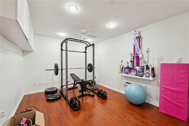 1311 SE Eastridge Cir, Blue Springs, MO 64014 - workout area with wood finished floors, ceiling fan, and recessed lighting