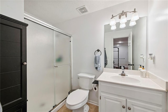 1311 SE Eastridge Cir, Blue Springs, MO 64014 - bathroom with vanity, a shower stall, tile patterned floors, and a textured ceiling