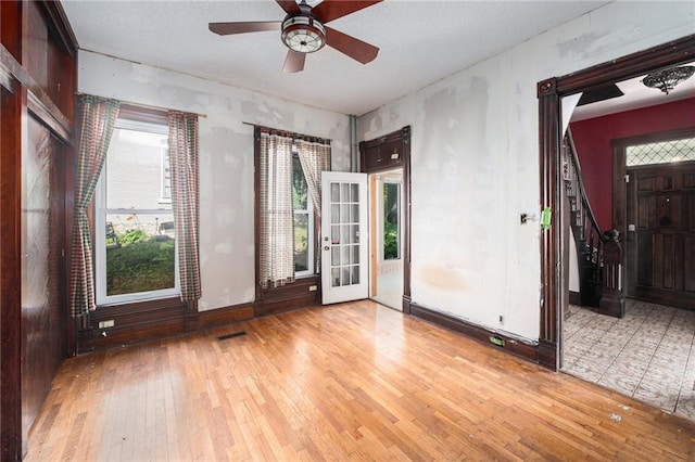 118 Spruce St, Leavenworth, KS 66048 - spare room featuring wood-type flooring and ceiling fan