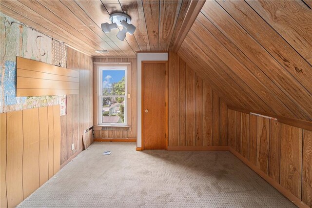 118 Spruce St, Leavenworth, KS 66048 - additional living space featuring wood ceiling, wooden walls, vaulted ceiling, and carpet floors