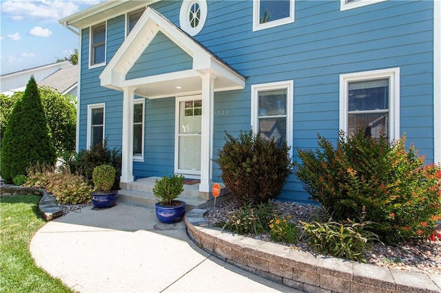 1321 SW Crossing Dr, Lees Summit, MO 64081 - doorway to property featuring a porch