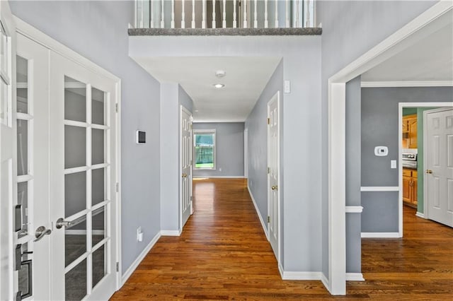 1321 SW Crossing Dr, Lees Summit, MO 64081 - hall with wood finished floors, french doors, and crown molding