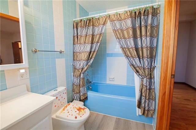 14610 State Route Dd Hwy, Savannah, MO 64485 - full bathroom featuring wood finished floors, shower / bath combo, vanity, and tile walls