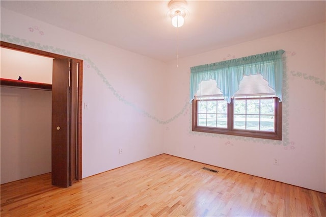 14610 State Route Dd Hwy, Savannah, MO 64485 - unfurnished bedroom featuring light wood-type flooring and a closet
