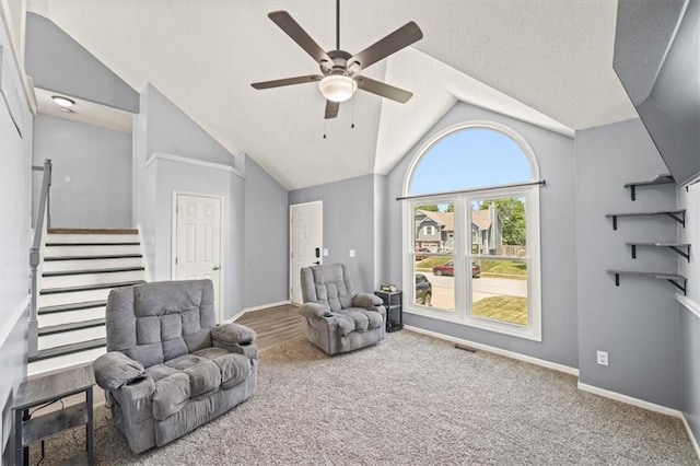 17277 W 157th St, Olathe, KS 66062 - sitting room featuring a ceiling fan, carpet flooring, vaulted ceiling, and stairs