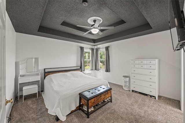 17277 W 157th St, Olathe, KS 66062 - bedroom with a raised ceiling, carpet flooring, a textured ceiling, and a ceiling fan