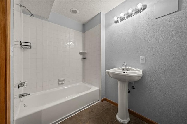 17277 W 157th St, Olathe, KS 66062 - bathroom with a textured ceiling, shower / bath combination, and a textured wall