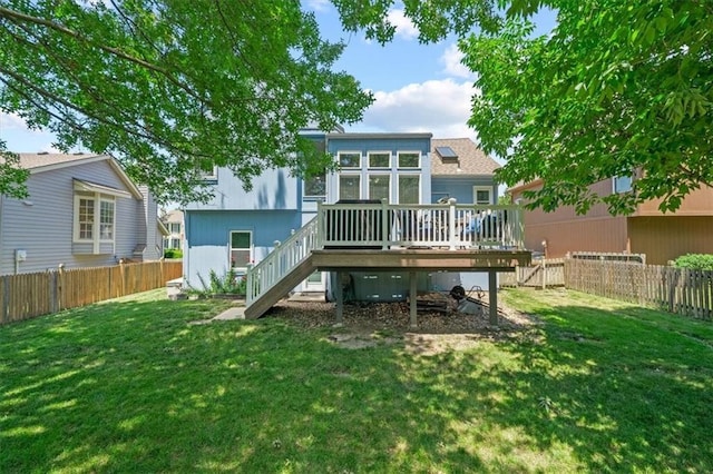 17277 W 157th St, Olathe, KS 66062 - back of property featuring stairs, a wooden deck, and a fenced backyard