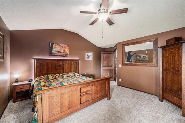 9750 SW 200th St, Smithville, MO 64089 - bedroom featuring light colored carpet, vaulted ceiling, and a ceiling fan