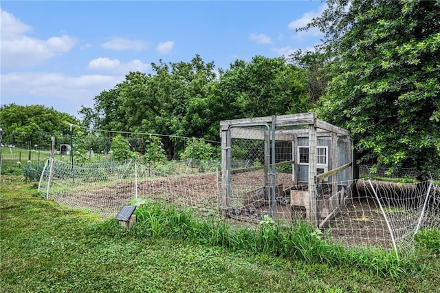 9750 SW 200th St, Smithville, MO 64089 - view of yard with exterior structure and an outbuilding