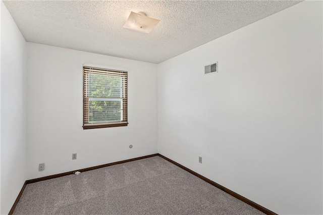 10131 W 84th St, Overland Park, KS 66212 - carpeted empty room with a textured ceiling and baseboards