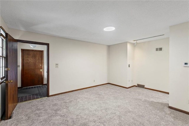 10131 W 84th St, Overland Park, KS 66212 - spare room with carpet floors and a textured ceiling