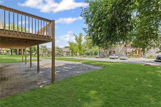 10131 W 84th St, Overland Park, KS 66212 - view of green lawn with a deck