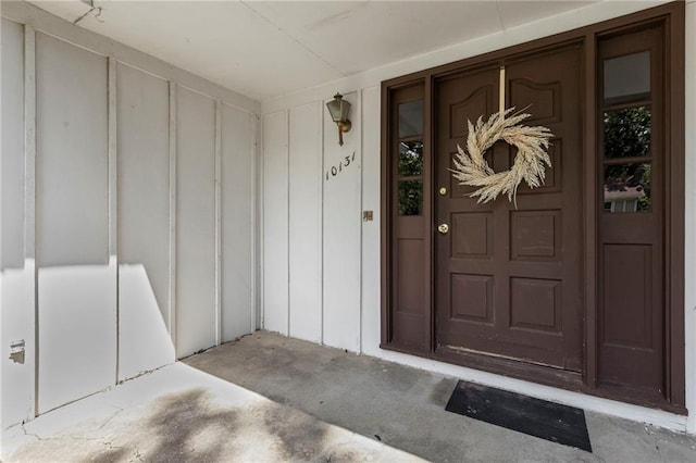 10131 W 84th St, Overland Park, KS 66212 - entrance to property with board and batten siding and a porch