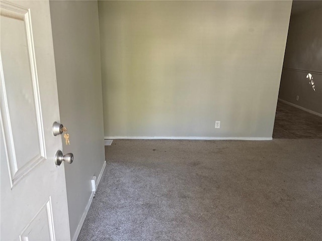 6310 E 153rd St, Grandview, MO 64030 - spare room featuring carpet and baseboards