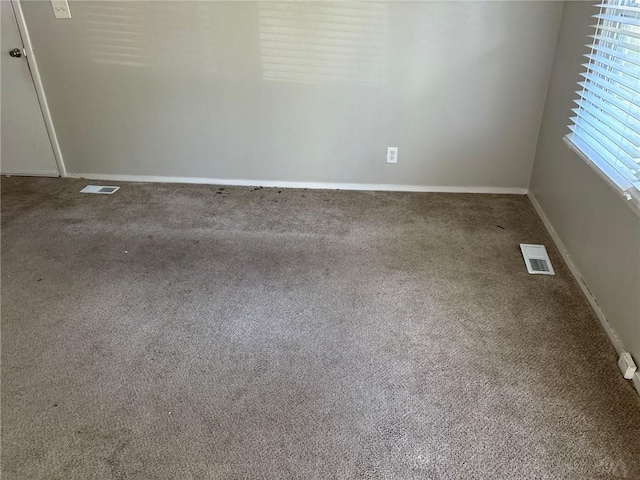 6310 E 153rd St, Grandview, MO 64030 - carpeted empty room featuring baseboards