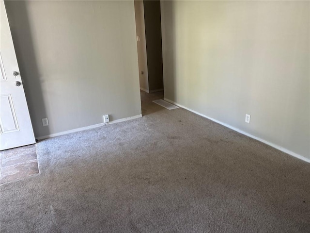 6310 E 153rd St, Grandview, MO 64030 - carpeted spare room featuring baseboards