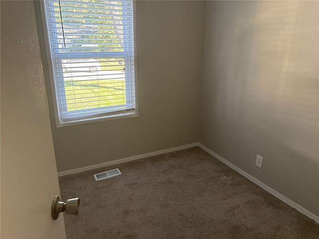 6310 E 153rd St, Grandview, MO 64030 - empty room with carpet floors and baseboards