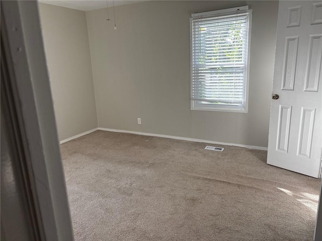 6310 E 153rd St, Grandview, MO 64030 - empty room with carpet floors and baseboards
