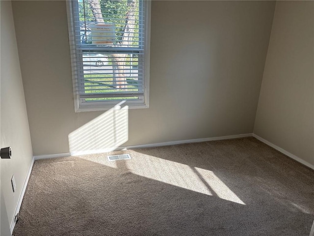 6310 E 153rd St, Grandview, MO 64030 - carpeted spare room with baseboards