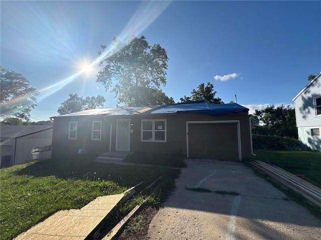 6310 E 153rd St, Grandview, MO 64030 - single story home with an attached garage and driveway