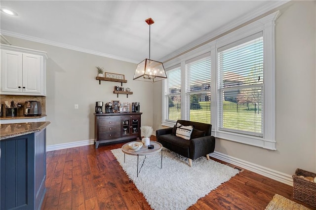 204 SW Ansel Adams Dr, Lees Summit, MO 64081 - living area with dark wood finished floors, crown molding, and a chandelier