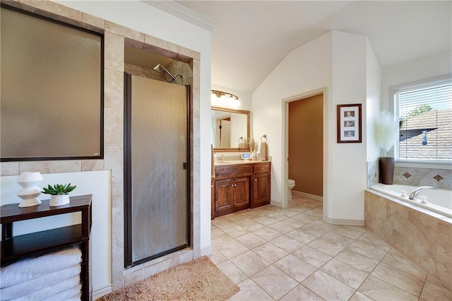 204 SW Ansel Adams Dr, Lees Summit, MO 64081 - bathroom with a shower stall, vanity, a bath, lofted ceiling, and tile patterned flooring