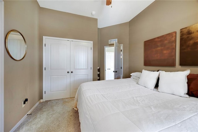 204 SW Ansel Adams Dr, Lees Summit, MO 64081 - carpeted bedroom with a closet, a towering ceiling, and a ceiling fan