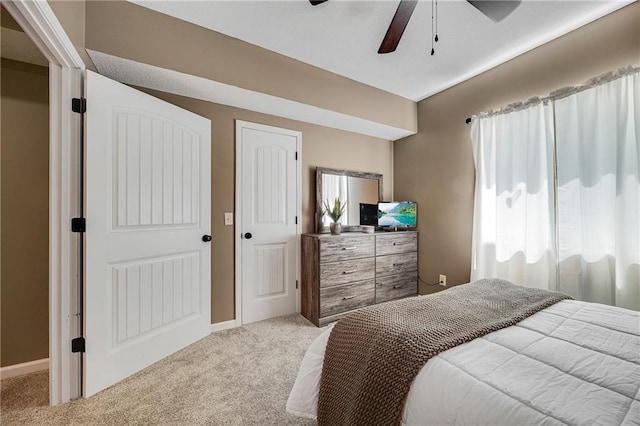 204 SW Ansel Adams Dr, Lees Summit, MO 64081 - carpeted bedroom with a ceiling fan