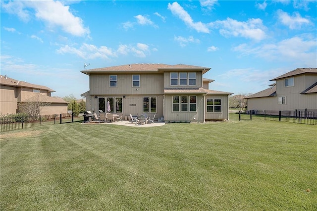 204 SW Ansel Adams Dr, Lees Summit, MO 64081 - rear view of house with a patio area and a fenced backyard