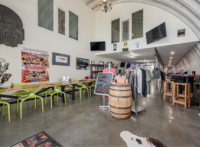 24305 Loring Rd, Lawrence, KS 66044 - misc room with finished concrete flooring and a towering ceiling