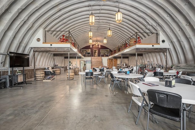 24305 Loring Rd, Lawrence, KS 66044 - misc room with concrete flooring and vaulted ceiling