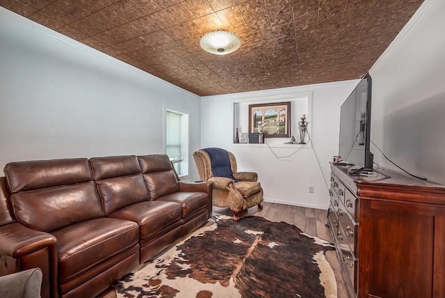 24305 Loring Rd, Lawrence, KS 66044 - living area with wood finished floors, an ornate ceiling, and crown molding