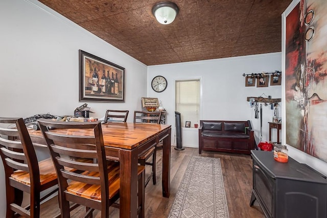 24305 Loring Rd, Lawrence, KS 66044 - dining space featuring an ornate ceiling, dark wood finished floors, and crown molding