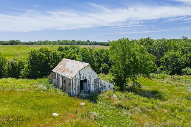 24305 Loring Rd, Lawrence, KS 66044 - view of barn featuring a rural view