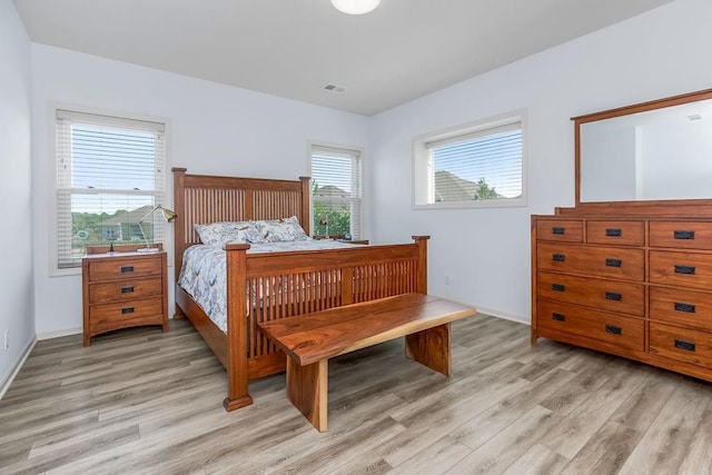 8319 Pickering St, Lenexa, KS 66227 - bedroom featuring light wood-style flooring and baseboards