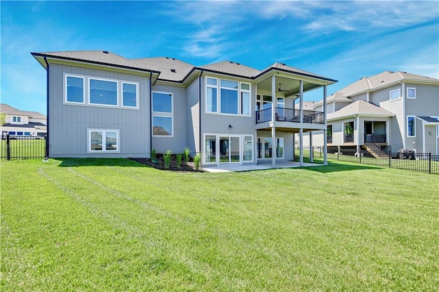 11126 W 172nd Ter, Overland Park, KS 66221 - back of house with a balcony, a patio area, and a fenced backyard