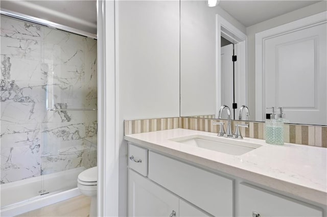 11126 W 172nd Ter, Overland Park, KS 66221 - bathroom with vanity and a marble finish shower