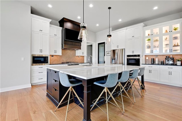 11126 W 172nd Ter, Overland Park, KS 66221 - kitchen with appliances with stainless steel finishes, white cabinetry, decorative backsplash, and recessed lighting