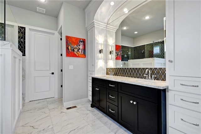 11126 W 172nd Ter, Overland Park, KS 66221 - bathroom with double vanity, recessed lighting, marble finish flooring, and a shower