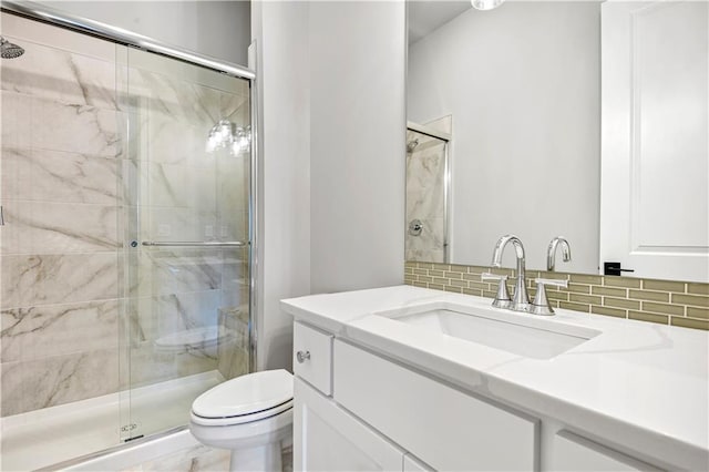 11126 W 172nd Ter, Overland Park, KS 66221 - bathroom featuring a shower stall, vanity, and tasteful backsplash