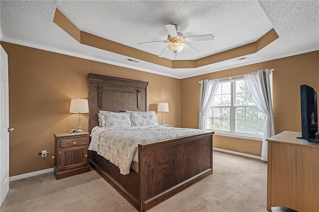 1210 NW Persimmon Dr, Grain Valley, MO 64029 - bedroom featuring a tray ceiling, a textured ceiling, light carpet, ornamental molding, and a ceiling fan