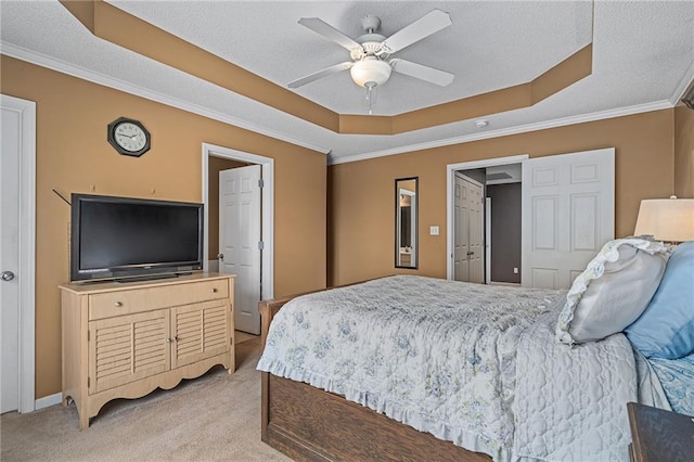 1210 NW Persimmon Dr, Grain Valley, MO 64029 - bedroom featuring a tray ceiling, ornamental molding, light colored carpet, ceiling fan, and a textured ceiling
