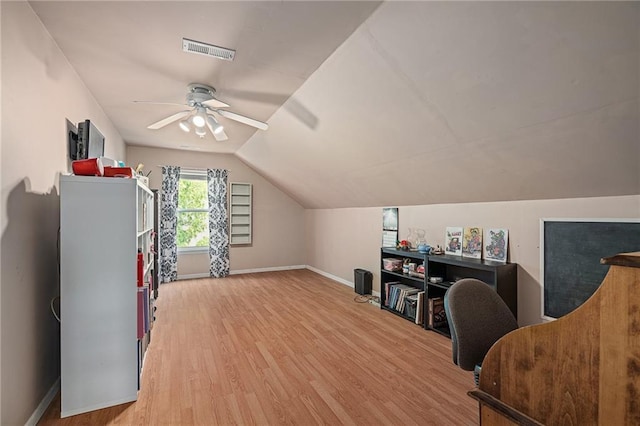 1210 NW Persimmon Dr, Grain Valley, MO 64029 - office featuring wood finished floors, ceiling fan, and lofted ceiling