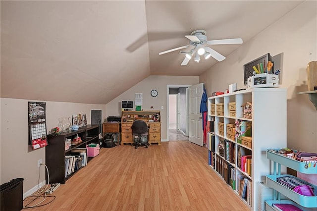 1210 NW Persimmon Dr, Grain Valley, MO 64029 - office space featuring wood finished floors, ceiling fan, and lofted ceiling