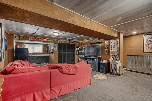 1210 NW Persimmon Dr, Grain Valley, MO 64029 - carpeted living room with wood ceiling