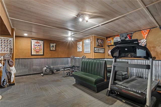 1210 NW Persimmon Dr, Grain Valley, MO 64029 - exercise area with carpet flooring and wood ceiling