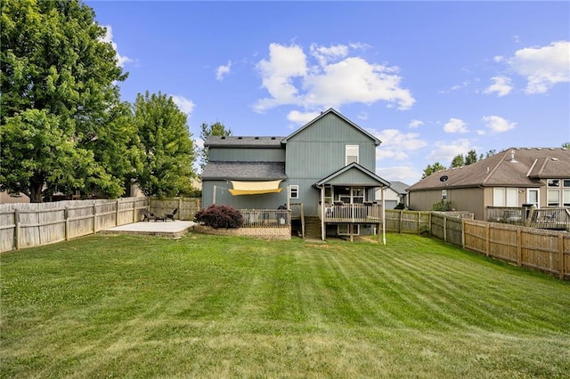 1210 NW Persimmon Dr, Grain Valley, MO 64029 - rear view of house featuring a patio, a fenced backyard, and a shingled roof