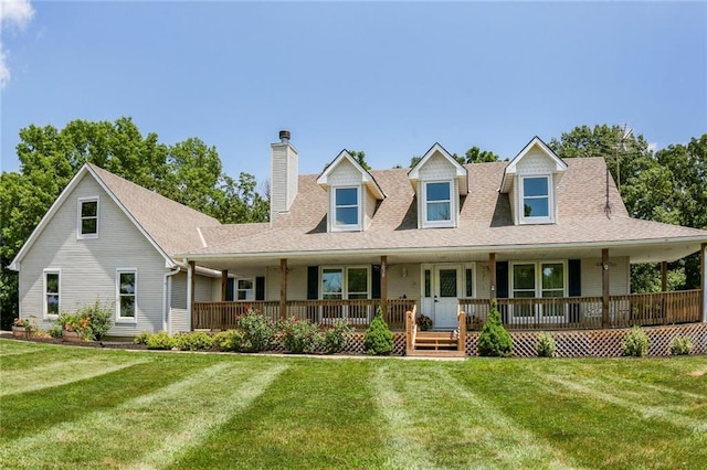 3038 Weaver School Rd, Odessa, MO 64076 - view of front of property with a chimney, a front yard, and covered porch